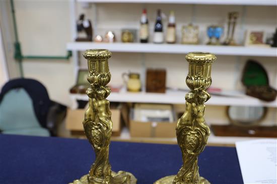 A pair Louis XVI ormolu candlesticks, height 12in.